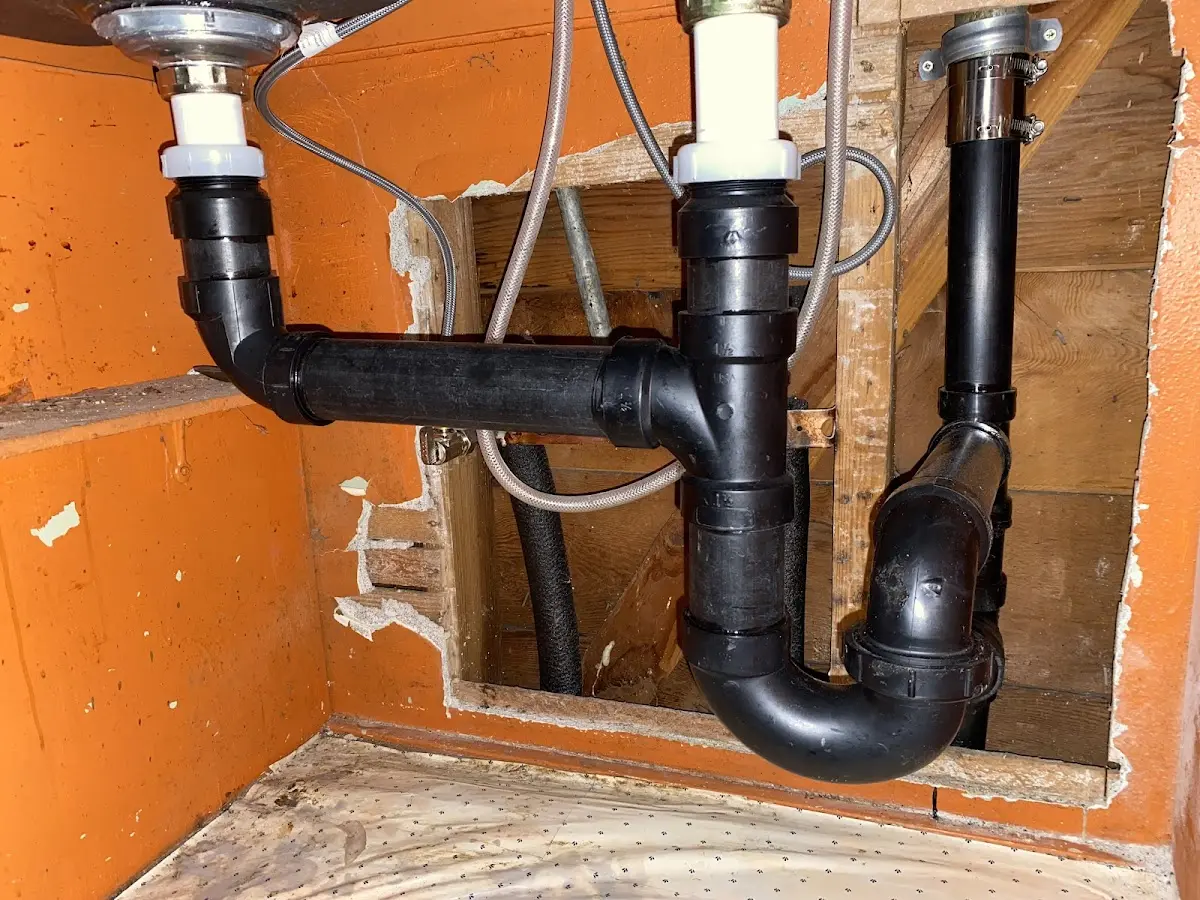 Professional Garbage Disposal Repair equipment and tools on the job in Glassport